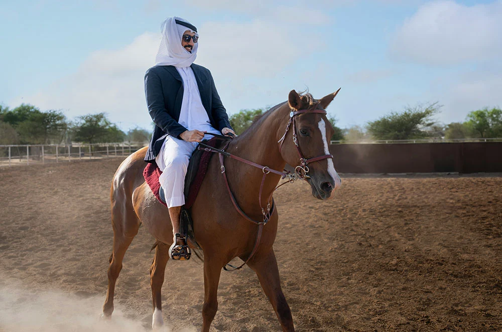 man on horse in dubai