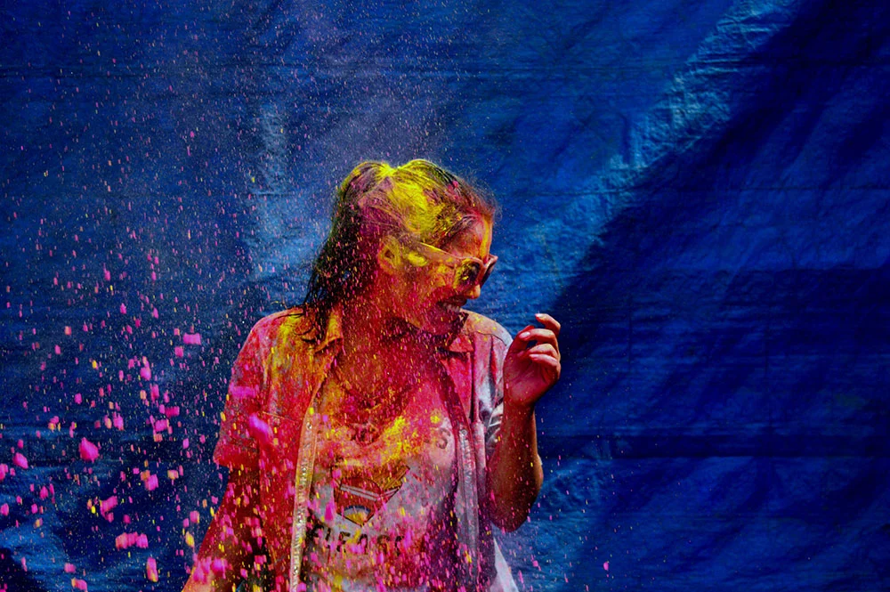 girl covered in powdered paint